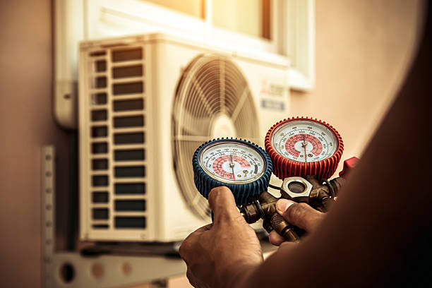 Professional Hvac technician working in Collinsville, VA
